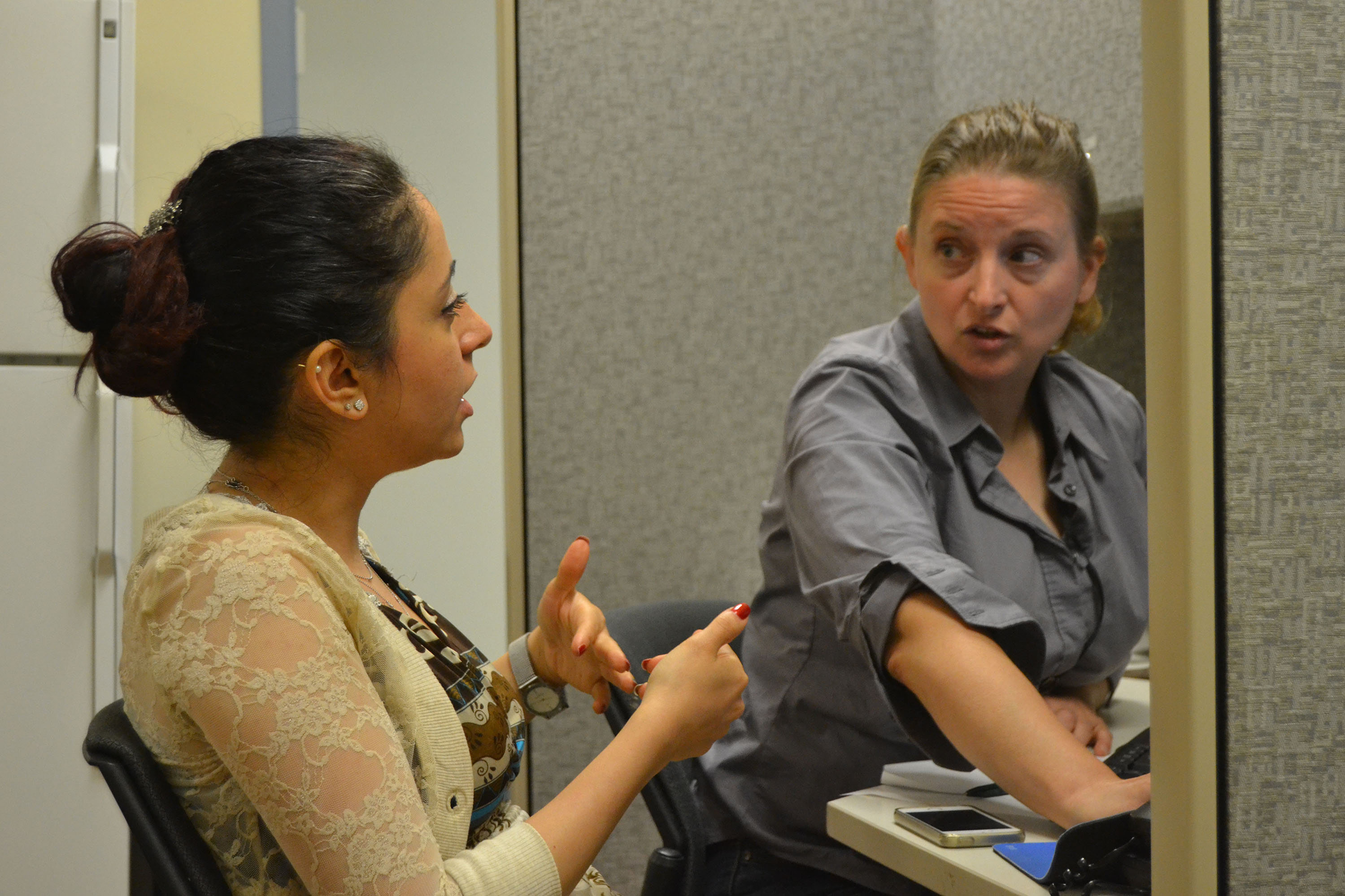 Professor Yannie ten-Broeke (right) brainstorming research ideas with student Behgol 